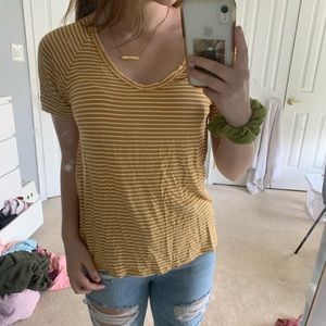 yellow and white striped american eagle shirt